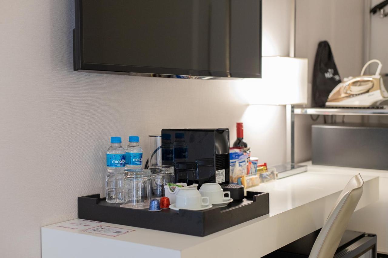 Hotel Radisson Rio De Janeiro Barra Exterior foto A Nespresso machine in a hotel room