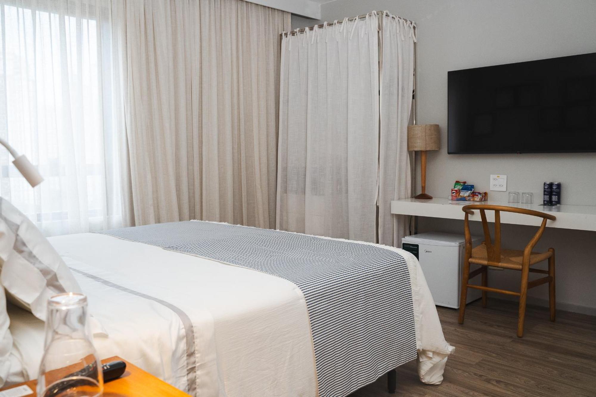 Hotel Radisson Rio De Janeiro Barra Habitación foto A room at the hotel